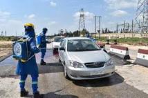 تعقيم الآليات والمركبات على مداخل مدينة حلب